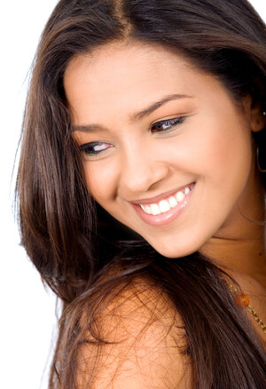 beautiful dark haired woman smiling bright white teeth, Baytown, TX cosmetic dentistry